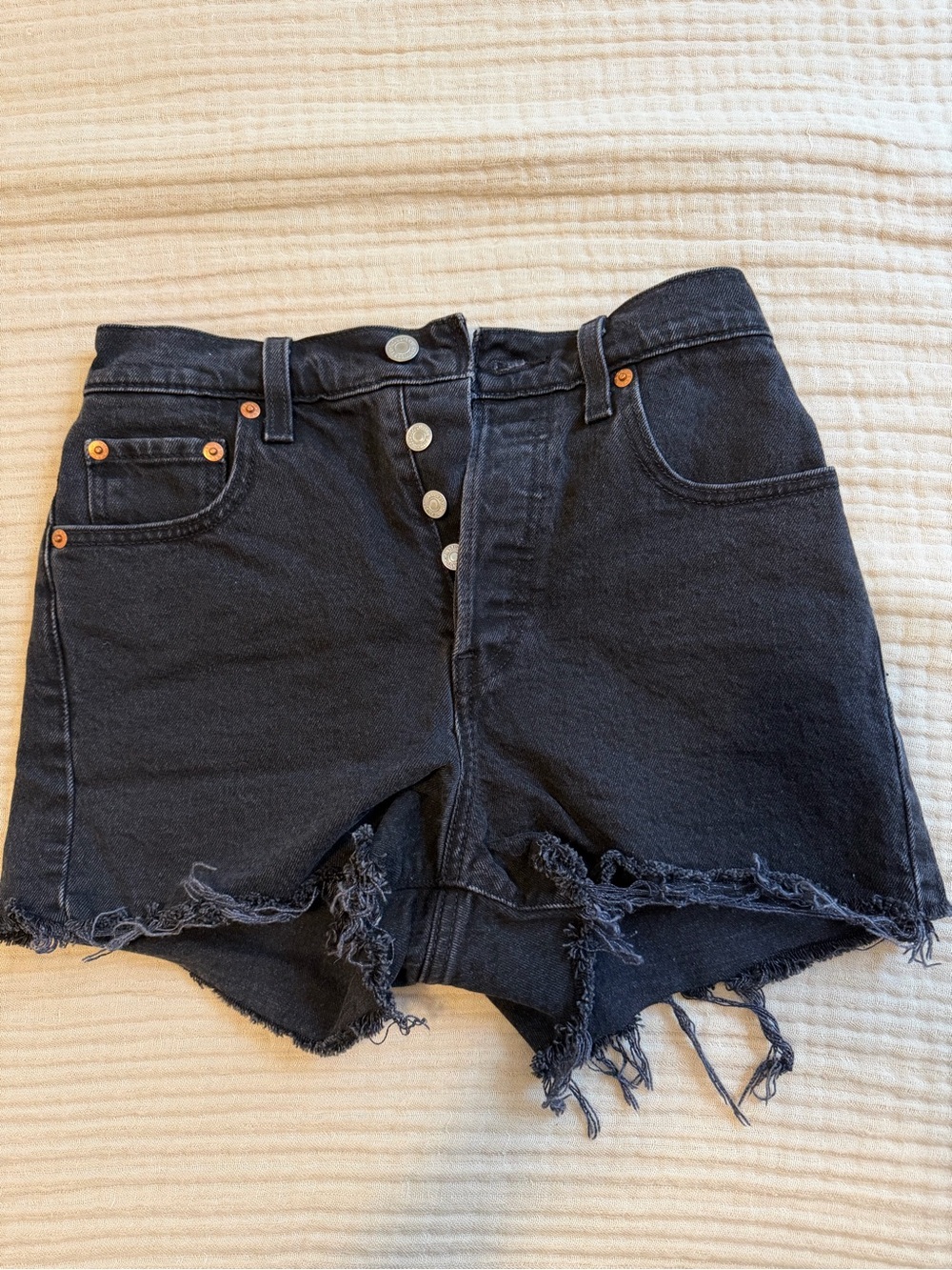 Levi’s High-Rise Black Distressed Denim Shorts